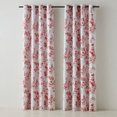 Floral patterned curtains on a plain background