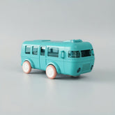 Turquoise toy bus on a light gray background