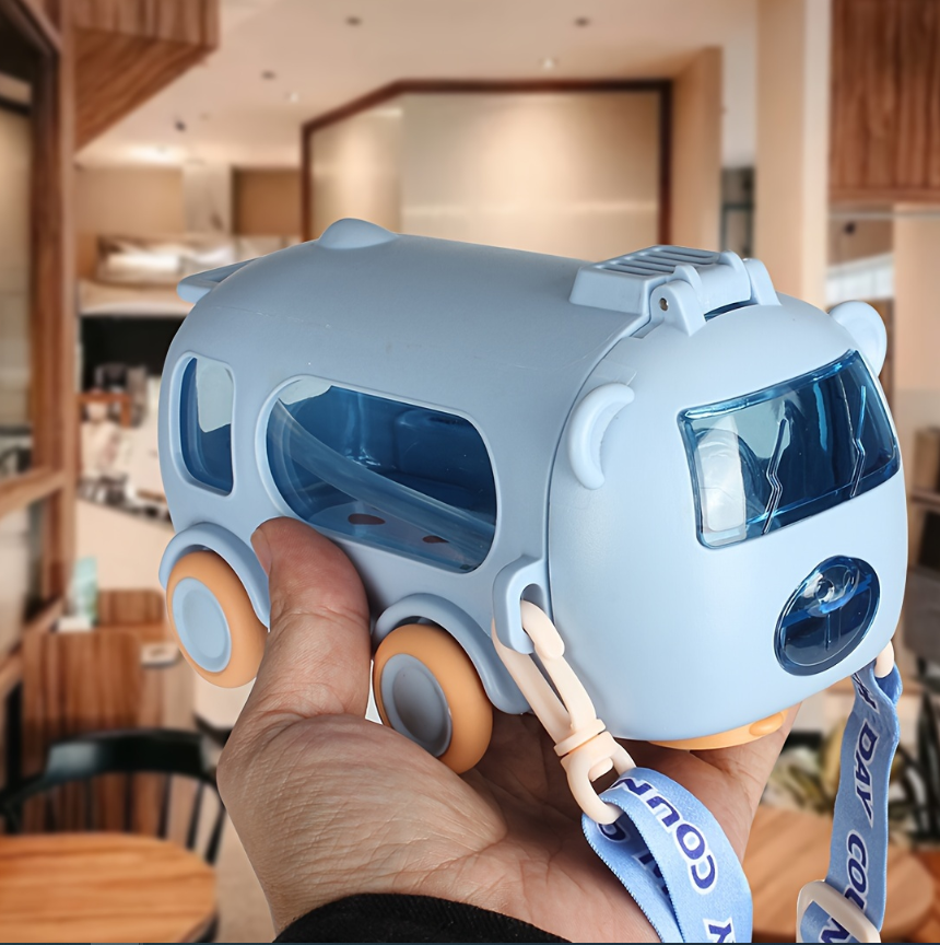 Blue and orange helmet with a strap held by a hand in an indoor setting