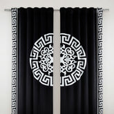 Black curtains with white decorative patterns on a gray background