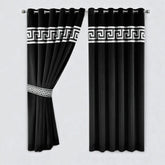 Black curtains with white decorative bands on a light gray background