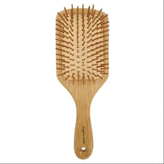 Wooden hairbrush with bristle design on a white background