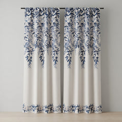 Pair of curtains with blue leaf pattern on a neutral background