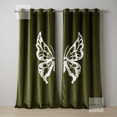 Brown curtains with white butterfly designs on a plain background