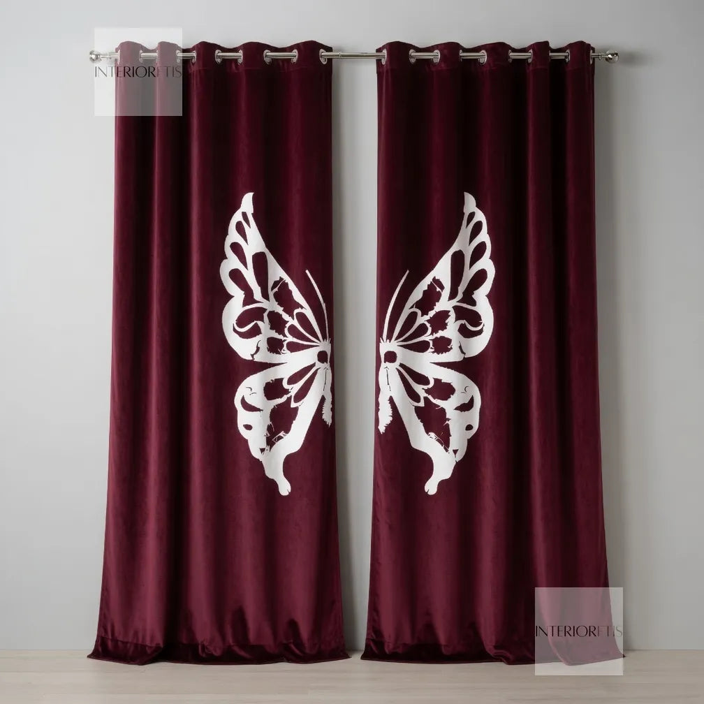 Maroon curtains with white butterfly designs on a plain background
