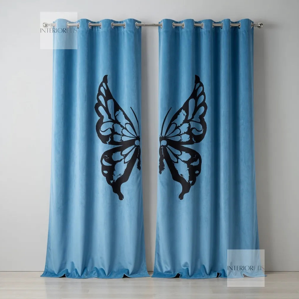 Blue curtains with a black butterfly design on a gray background