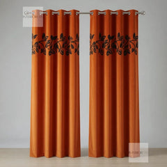 pair of floral vine orange curtains 
