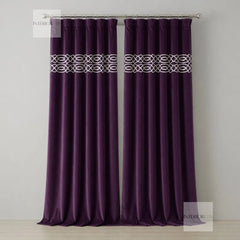 Pair of purple curtains with decorative bands on a gray background