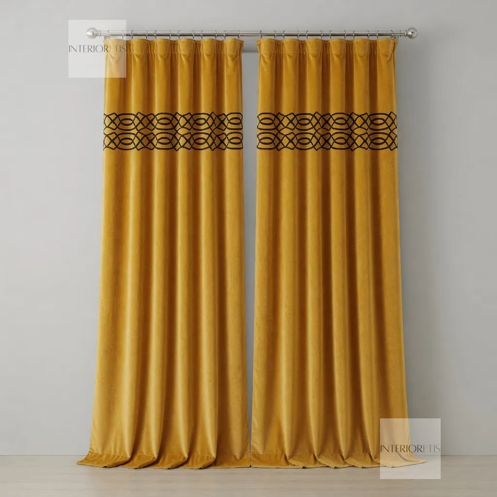 Pair of mustard yellow curtains with decorative top band on a gray background