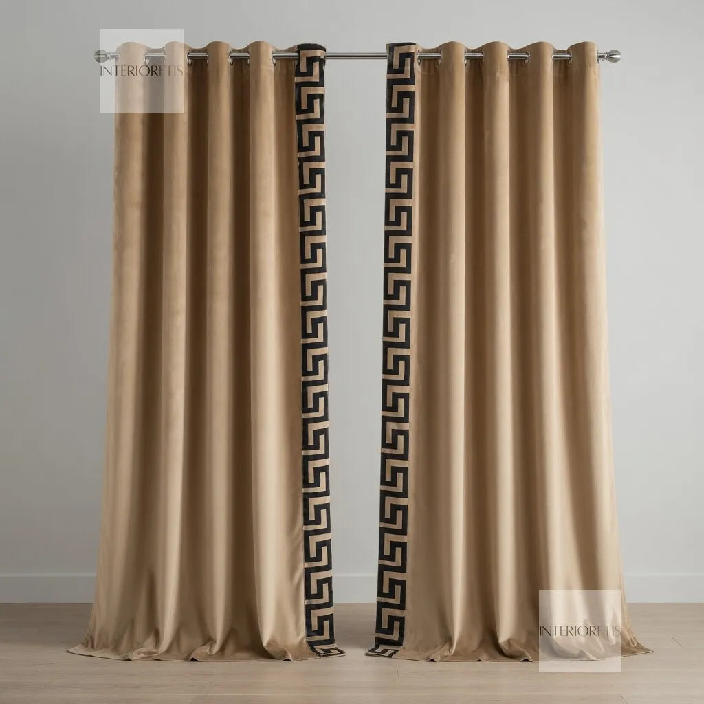 Pair of beige curtains with decorative black patterns on a gray background