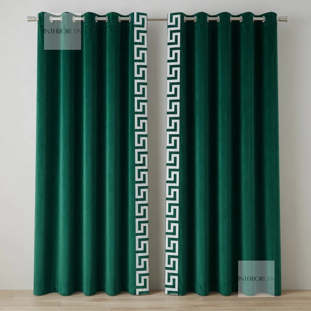 Green curtains with a decorative white pattern on a plain background