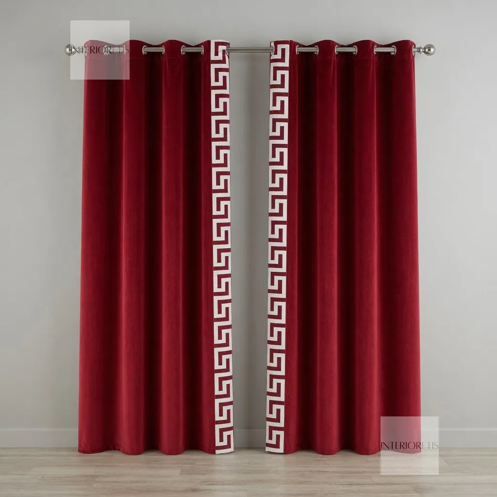 Red curtains with a white geometric pattern on a gray background