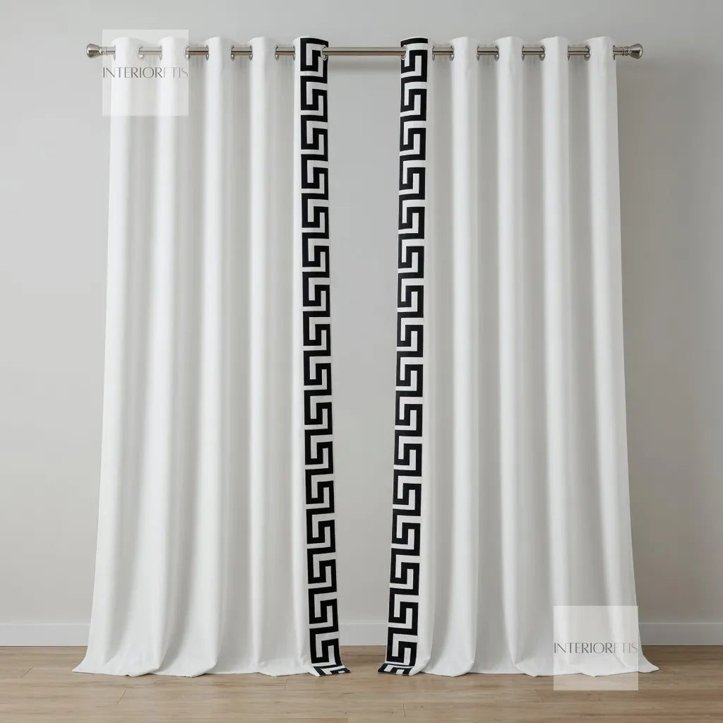 White curtains with black geometric patterns on a gray background