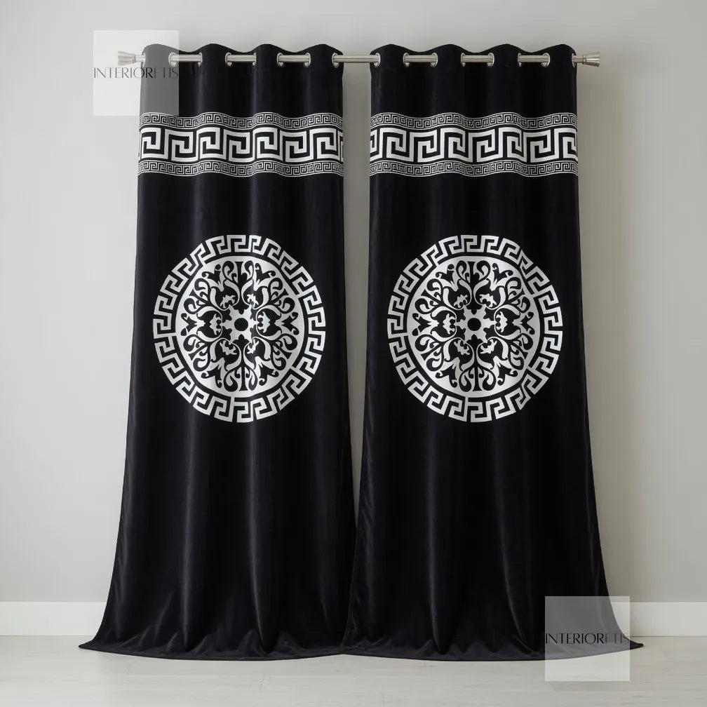 Black curtains with white geometric patterns on a gray background