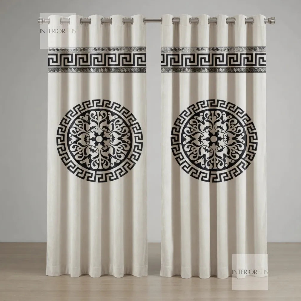 White curtains with black decorative patterns on a plain background