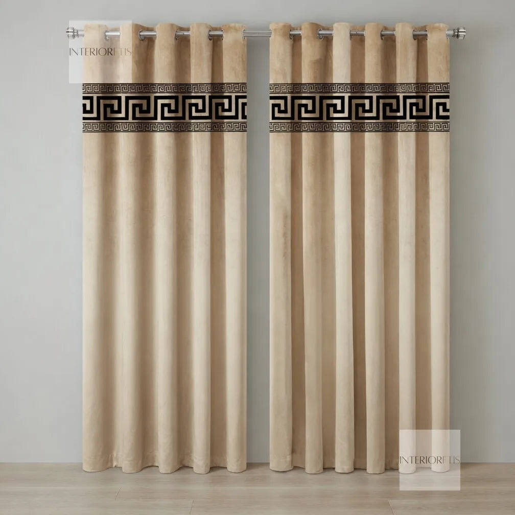 Pair of beige curtains with decorative band on a gray background