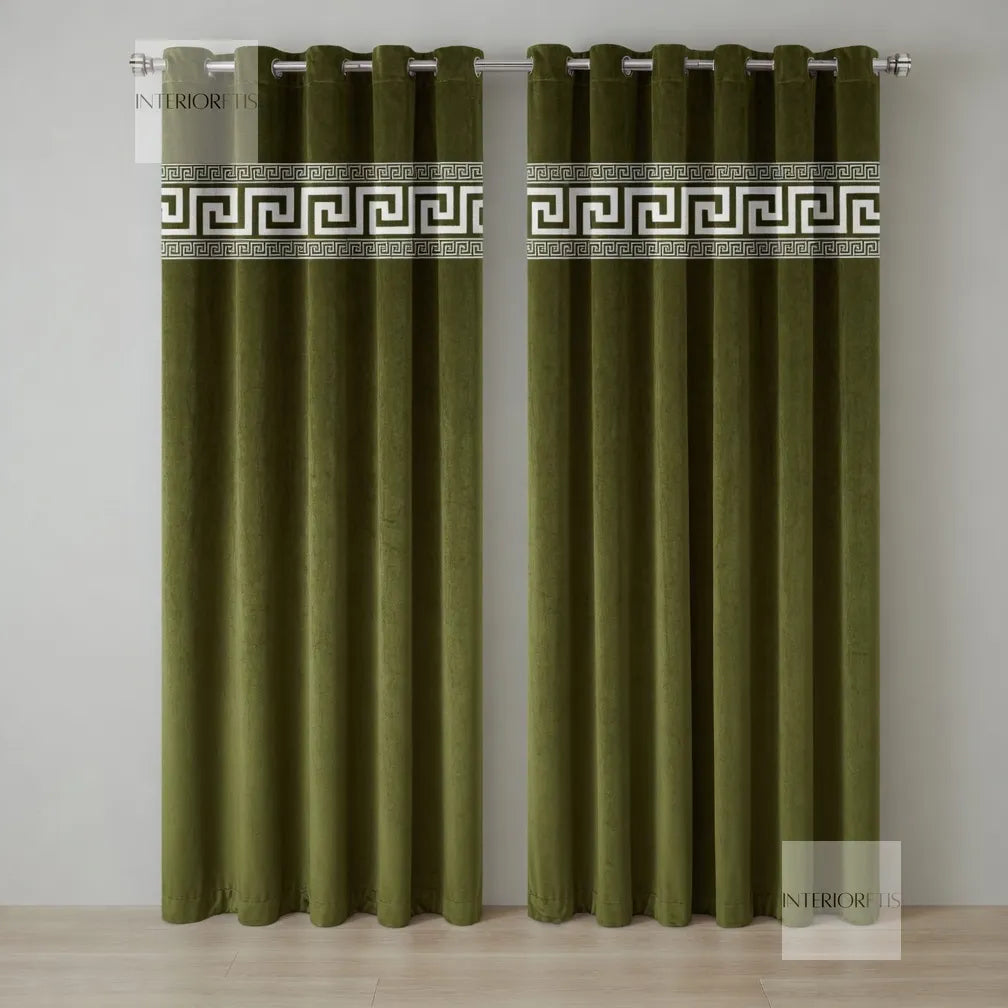 Pair of brown curtains with decorative banding on a plain background