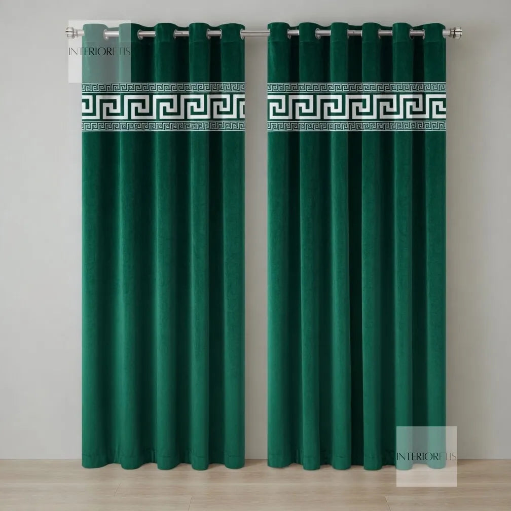 Pair of green curtains with decorative banding on a plain background