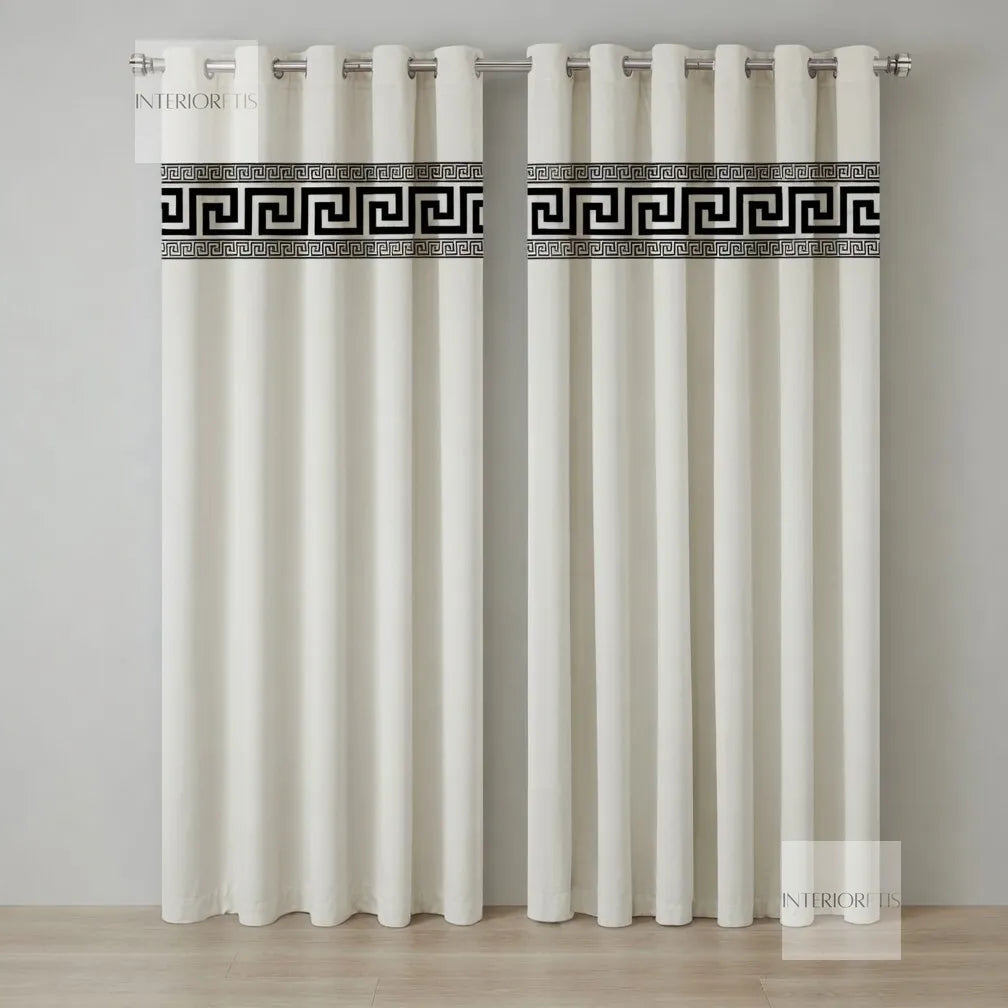 White curtains with a decorative black border on a gray background