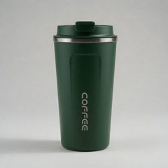 Green coffee tumbler with 'COFFEE' text on a light gray background