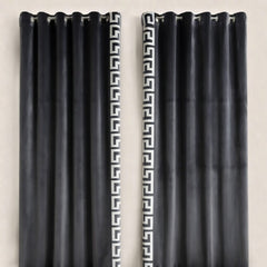 Grey curtains with white geometric patterns on a beige background