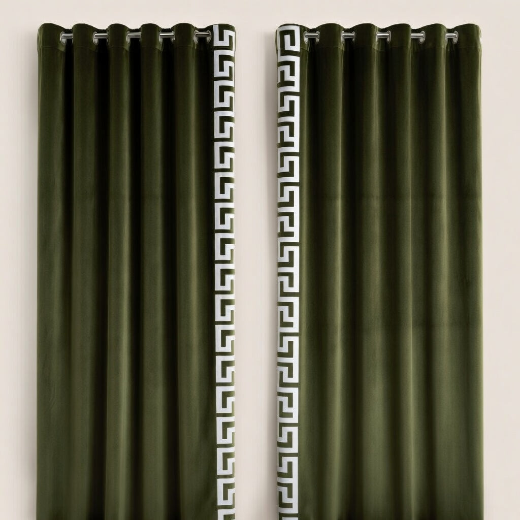 Pair of green curtains with a decorative white pattern on a beige background