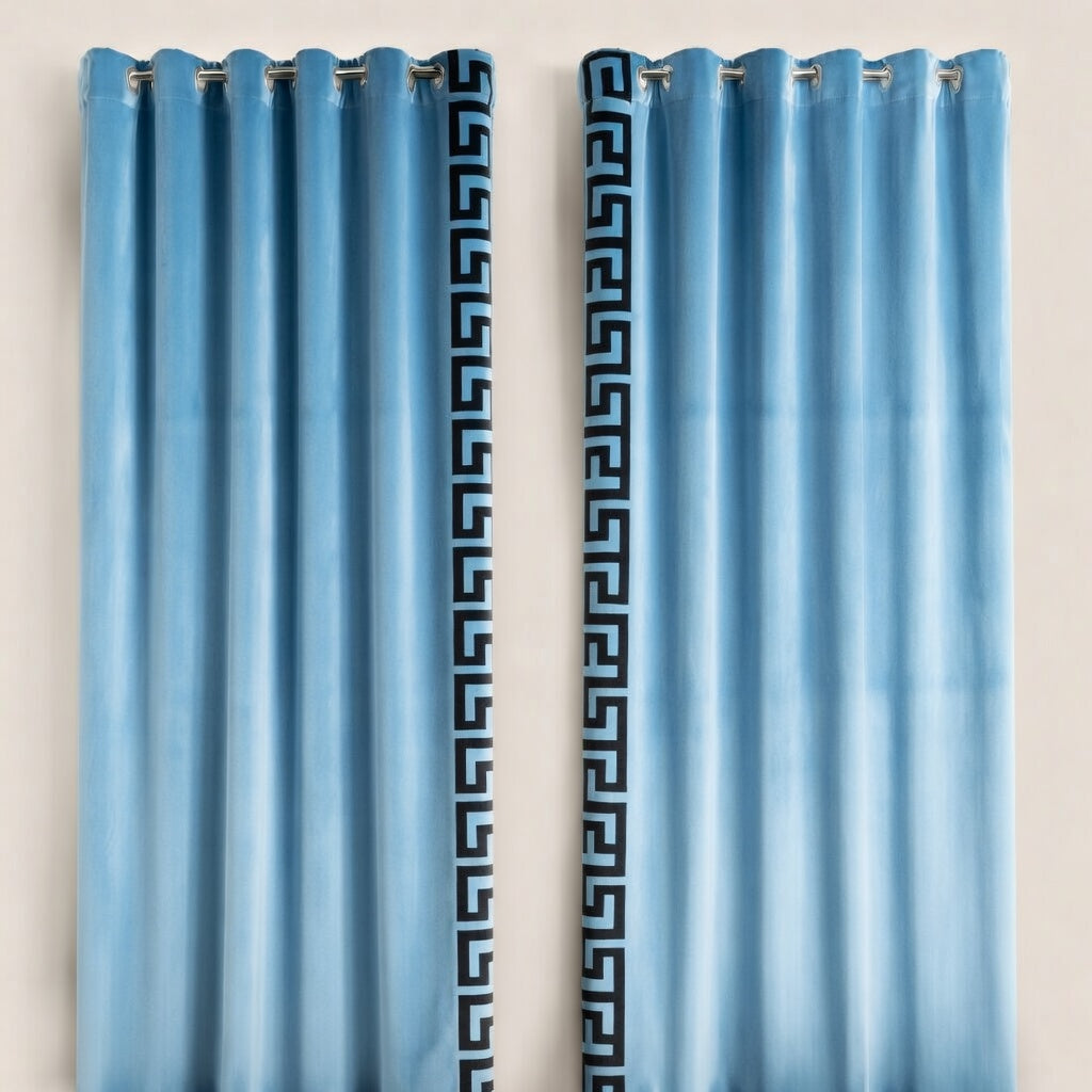 Pair of blue curtains with decorative patterns on a beige background