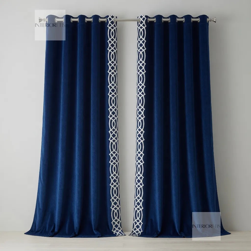 Navy blue curtains with white geometric patterns on a gray background
