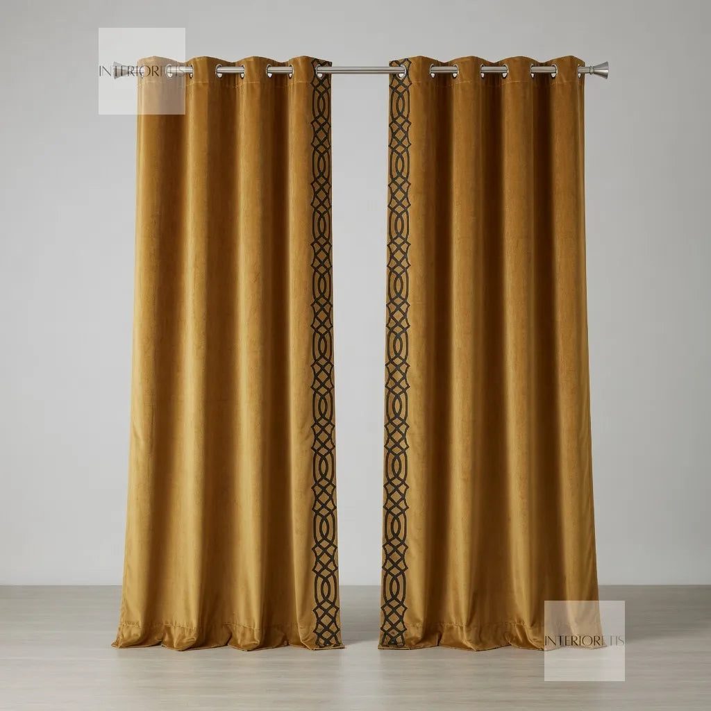 Gold curtains with decorative trim on a gray background