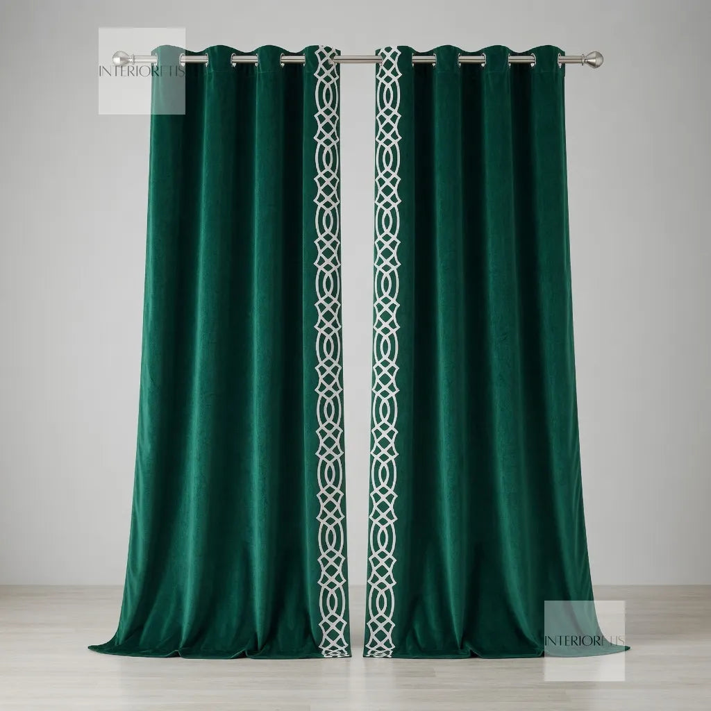 Green curtains with a white geometric pattern on a gray background