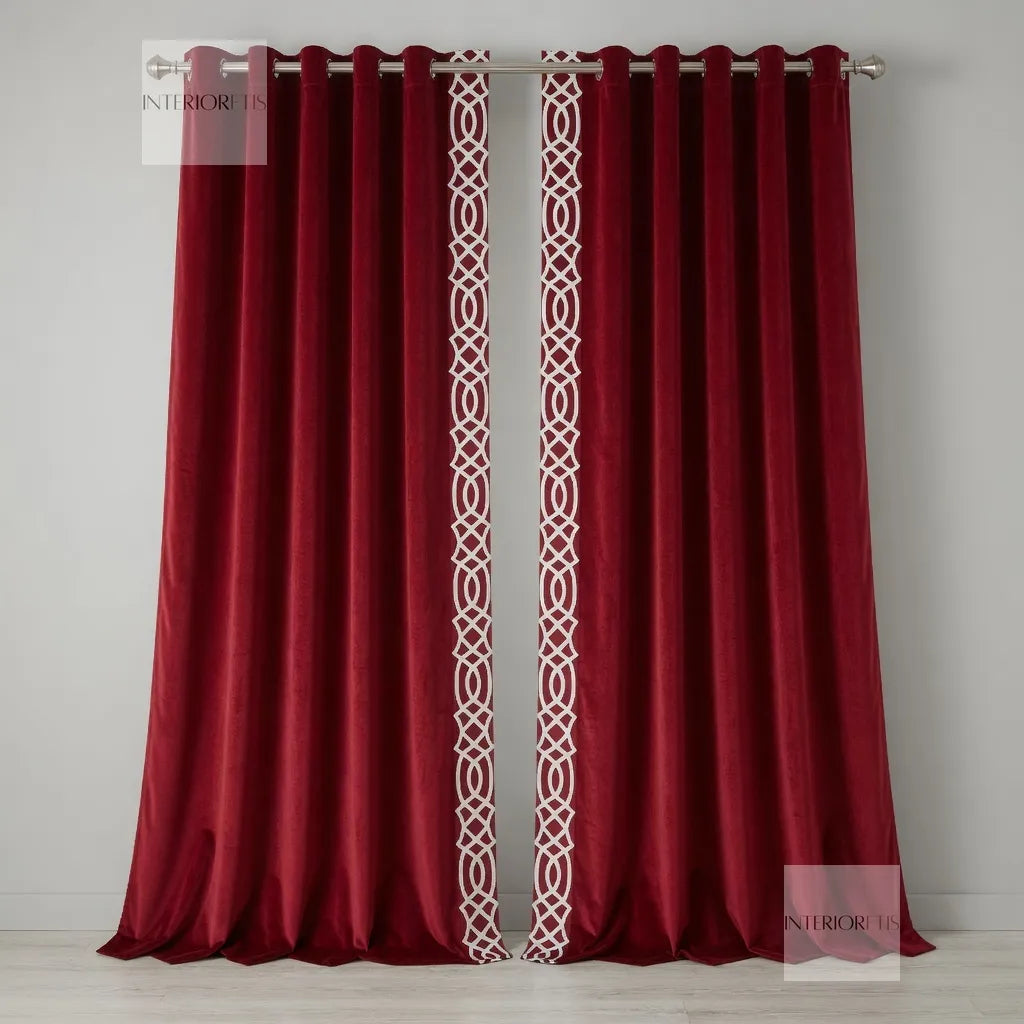Red curtains with a white geometric pattern on a gray background