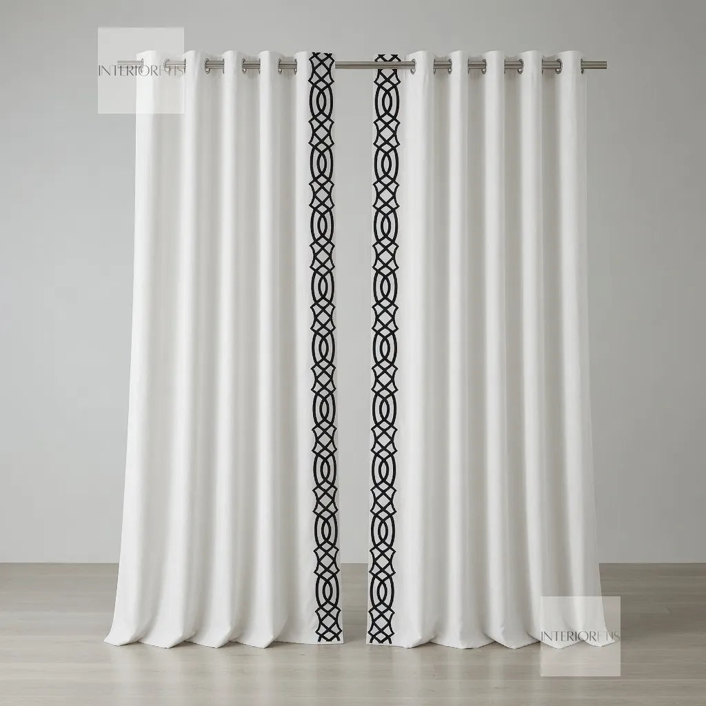 White curtains with black geometric pattern on a gray background