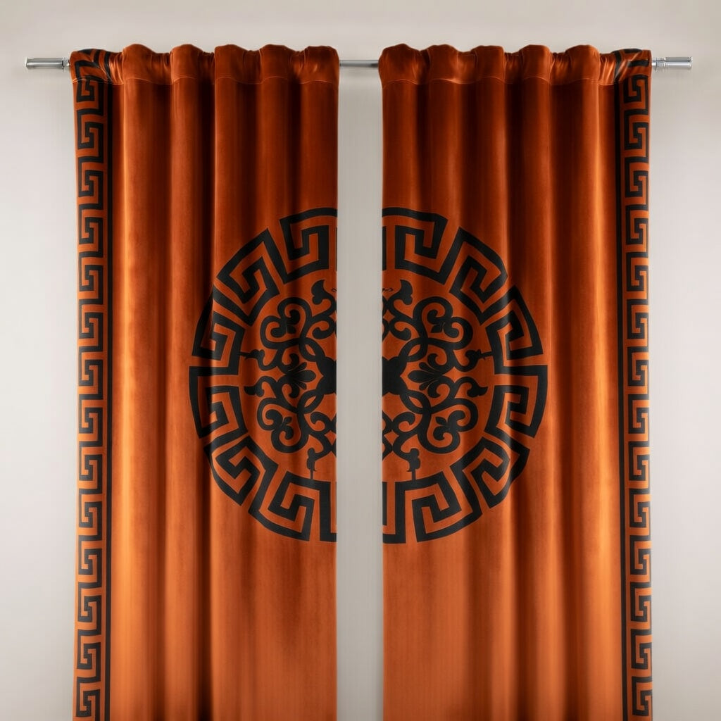 Pair of orange curtains with black geometric patterns on a white background