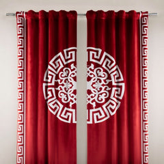 Red curtains with white decorative patterns on a gray background