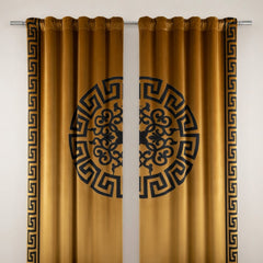 Pair of mustard yellow curtains with black decorative patterns on a white background