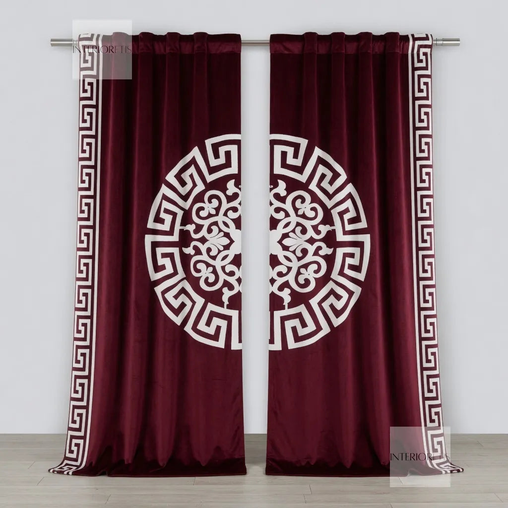 Maroon curtains with white decorative patterns on a gray background