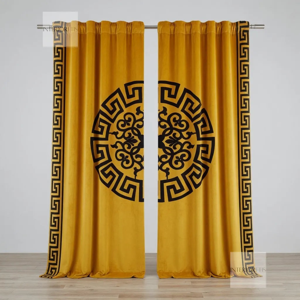 Mustard yellow curtains with black geometric patterns on a white background