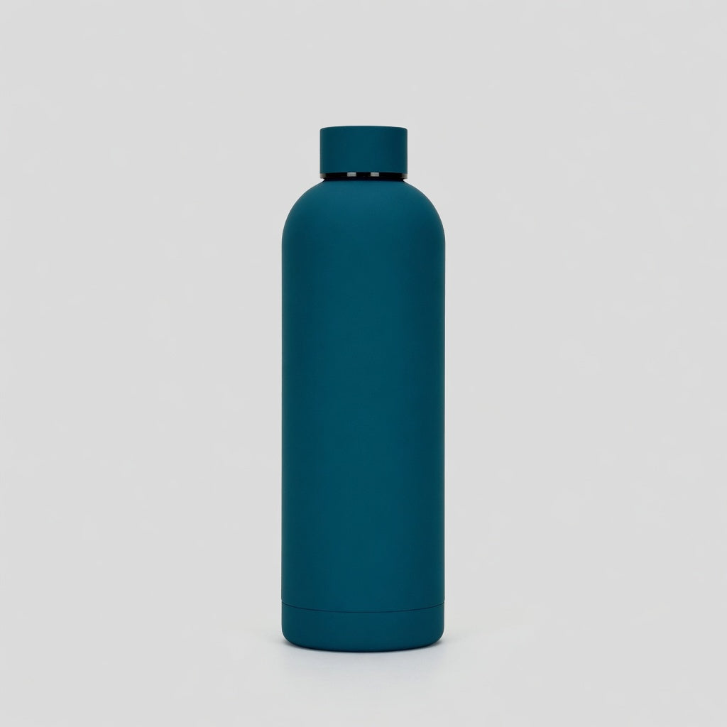 Teal water bottle on a light gray background