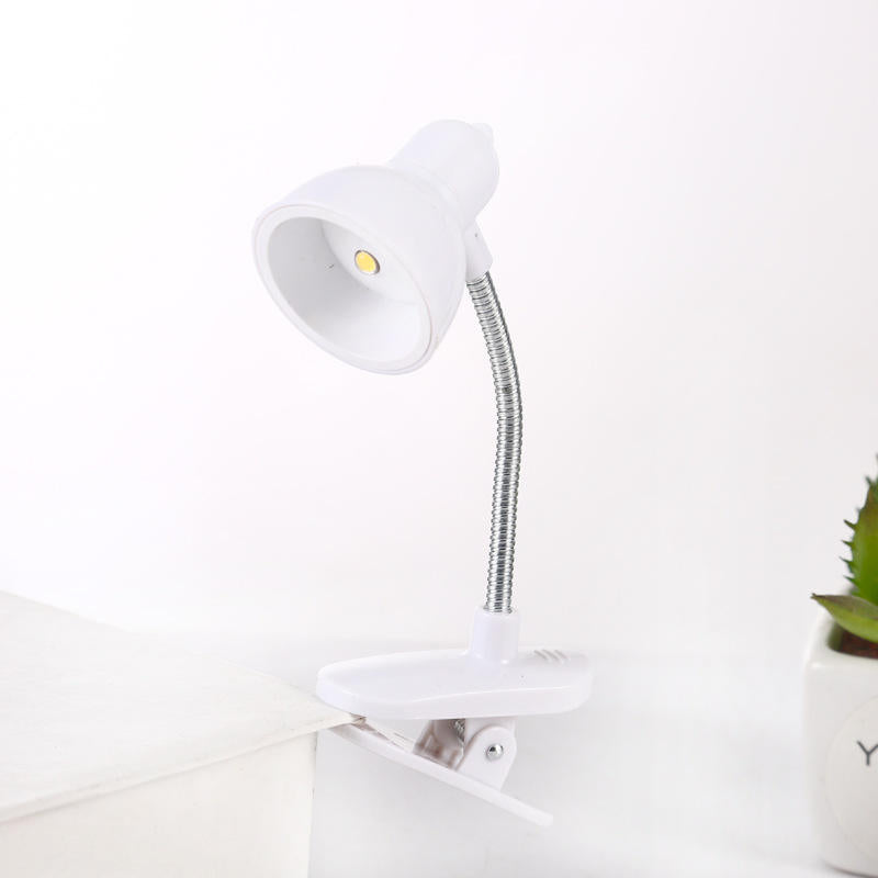 Adjustable neck LED reading lamp in use