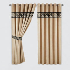 Beige curtains with black decorative banding on a white background